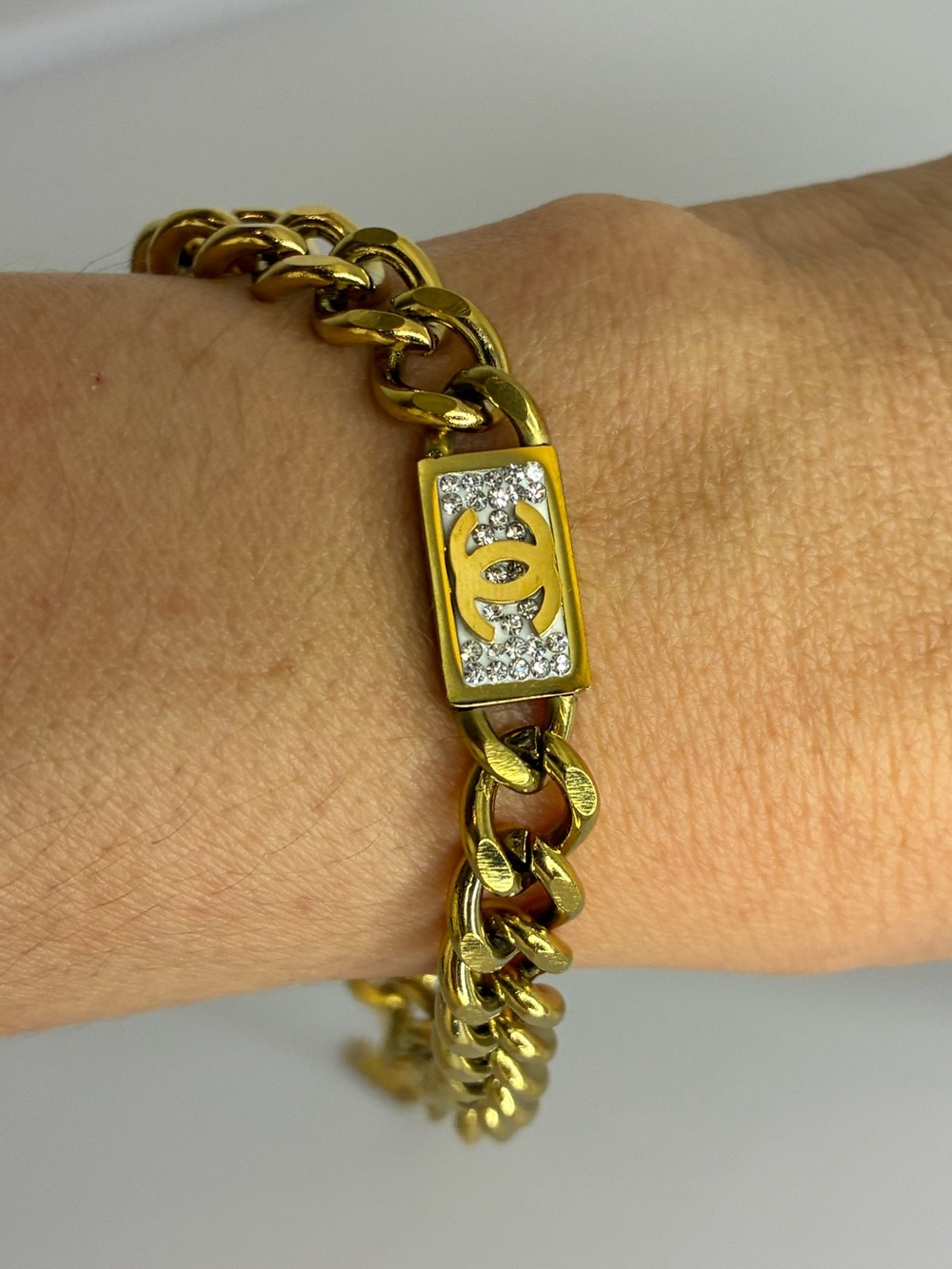 Gold Chain Link Bracelet with Crystal Logo Plaque